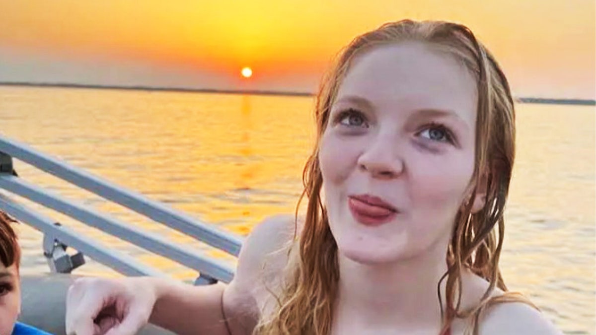 Katelynn Strate takes photo during sunset