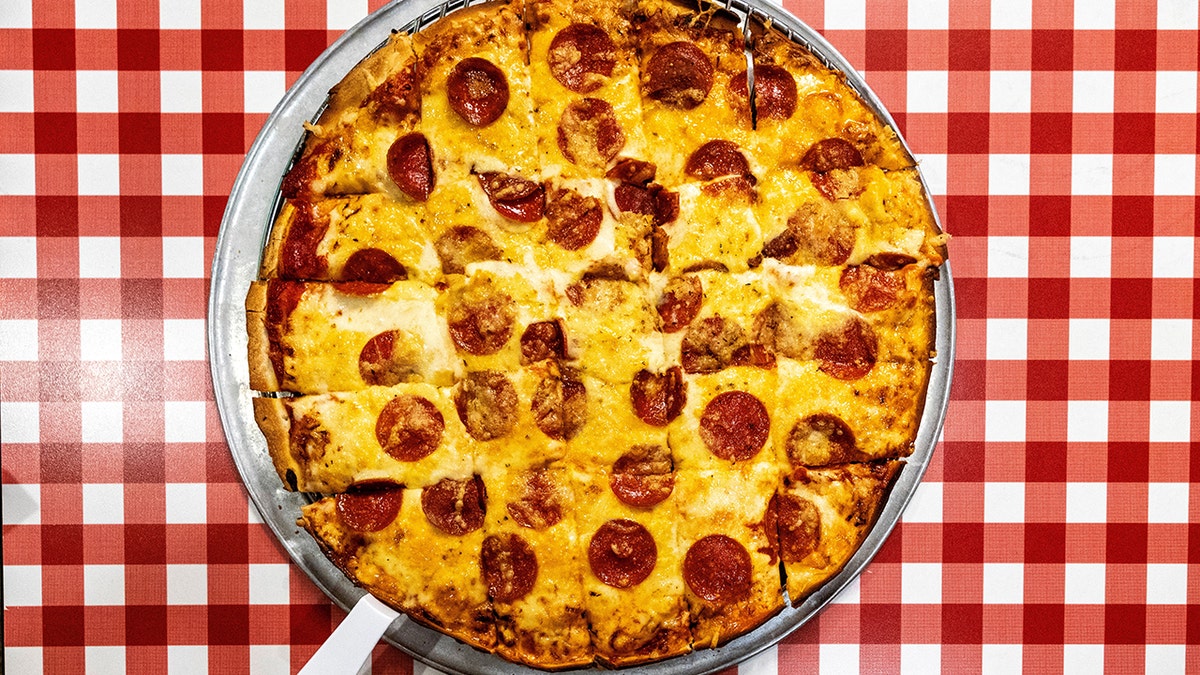 poperoni-pizza-from-aurelios Trust-Fuel Pizza Mission Pope Leo Fourths delivers the Holy Slice of the house