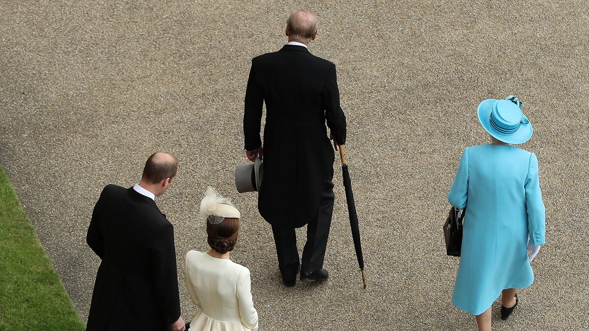 Prince Philip gave Kate Middleton golden rule for surviving the monarchy 8 Queen Elizabeth and Prince Philip walking ahead of Kate Middleton and Prince William