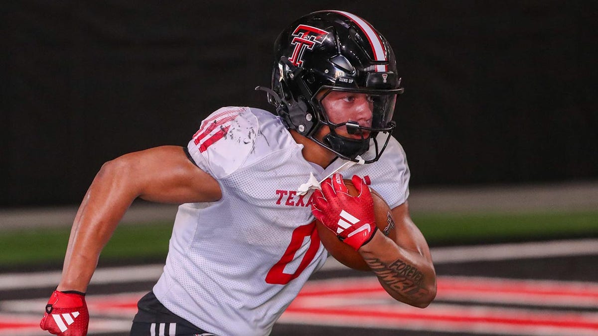 Quinten Joyner runs at practice