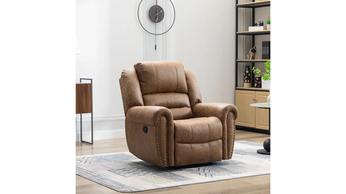 Recline in style with this plus, faux leather recliner. 