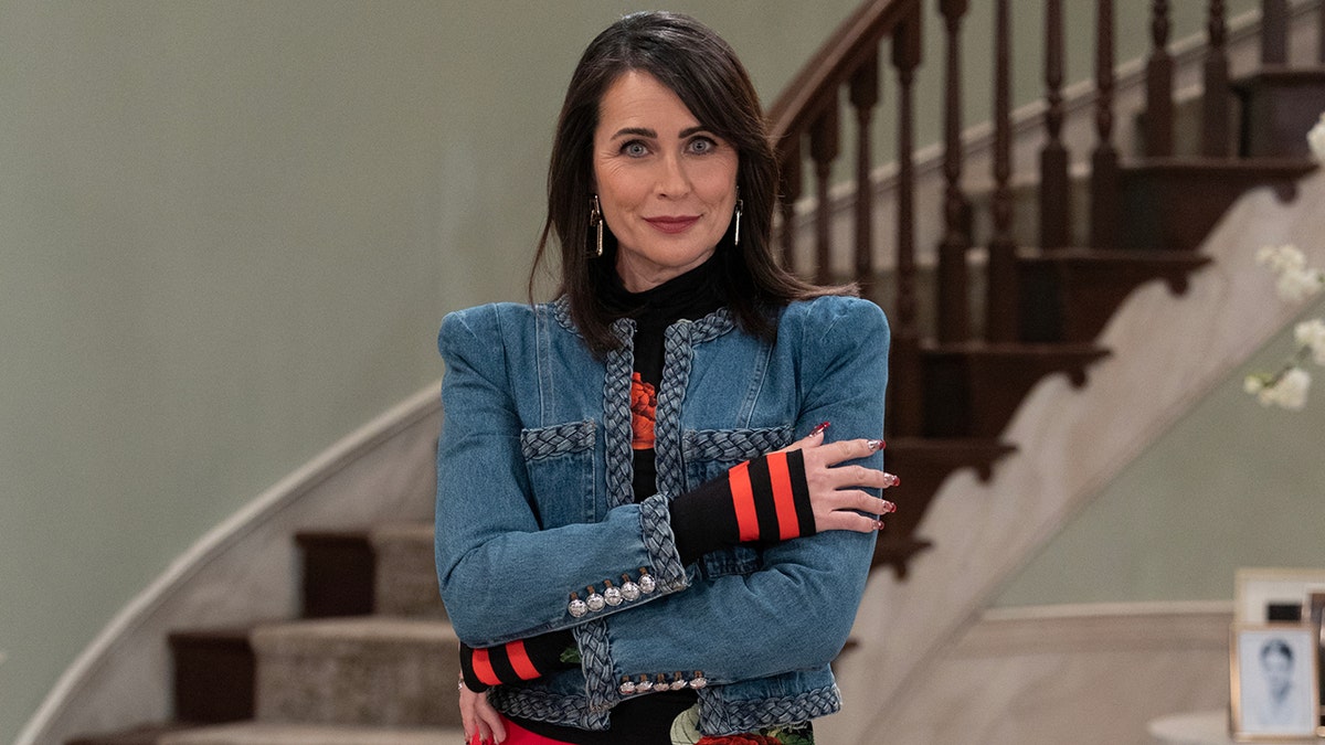 Rena Sofer in a blue jacket during an episode of "General Hospital"