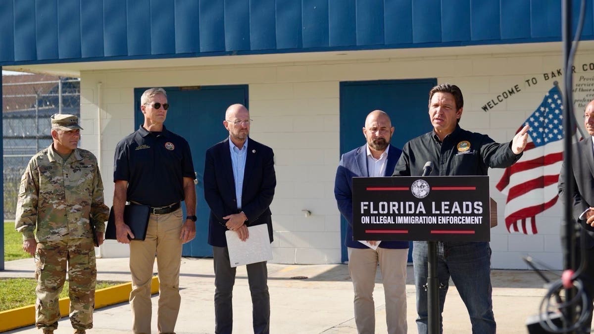 Florida Gov. Ron DeSantis at a press briefing with officials