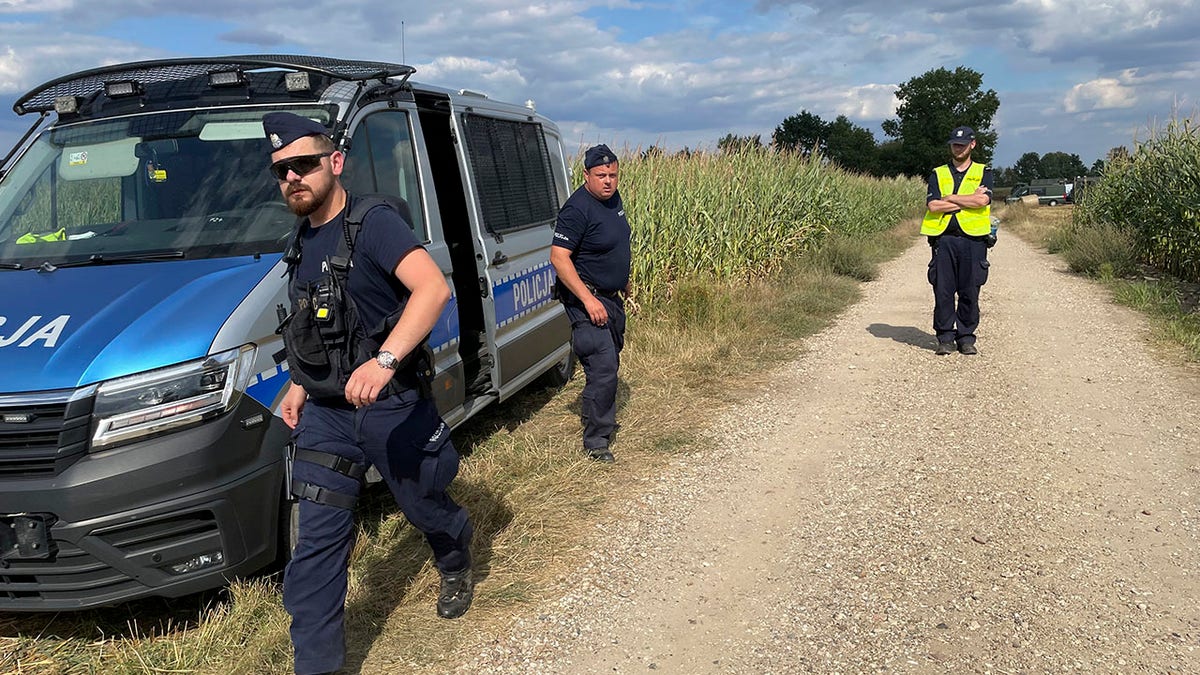 Polish authorities at the scene where a Russian drone crashed.