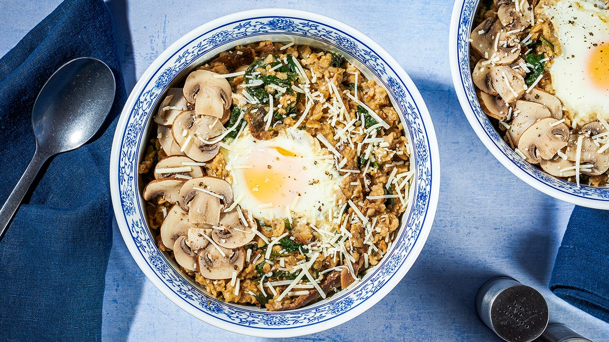 Savory oatmeal with mushrooms, spices and fried eggs in blue bowls, featured in Eat Voraciously newsletter, Washington, DC