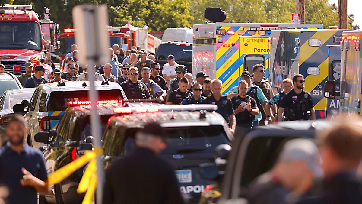 Police outside of a catholic school after mass shooting.
