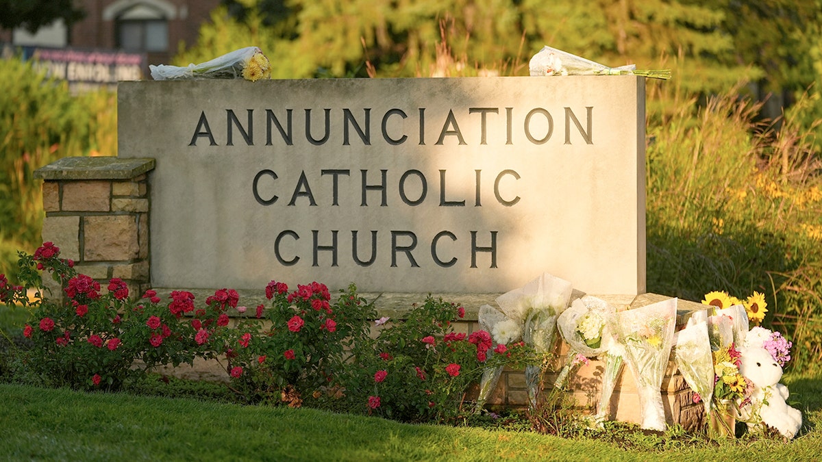 A memorial was created for victims of shooting at the mass school at the Catholic School Church.