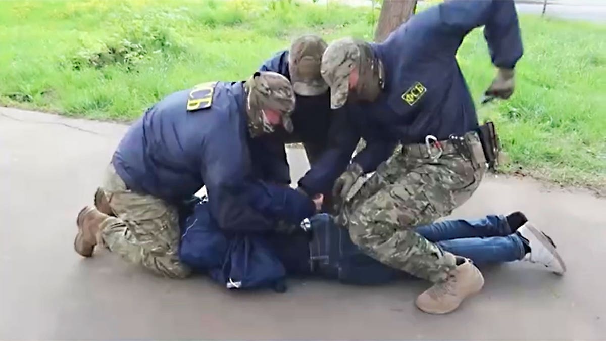 Sergei Irin arrested by masked Russian police forces