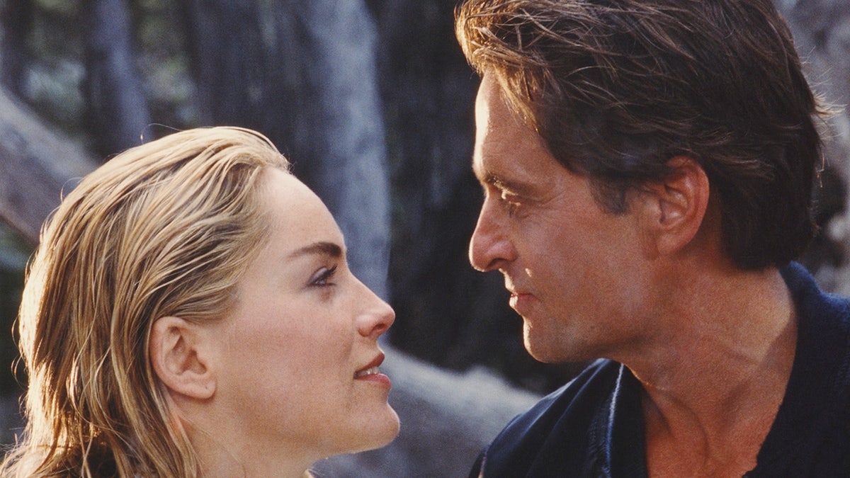 Sharon Stone and Michael Douglas talking in Basic Instinct