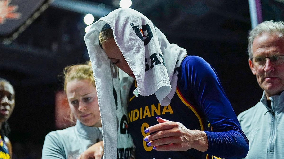 Sophie Cunningham helped off court