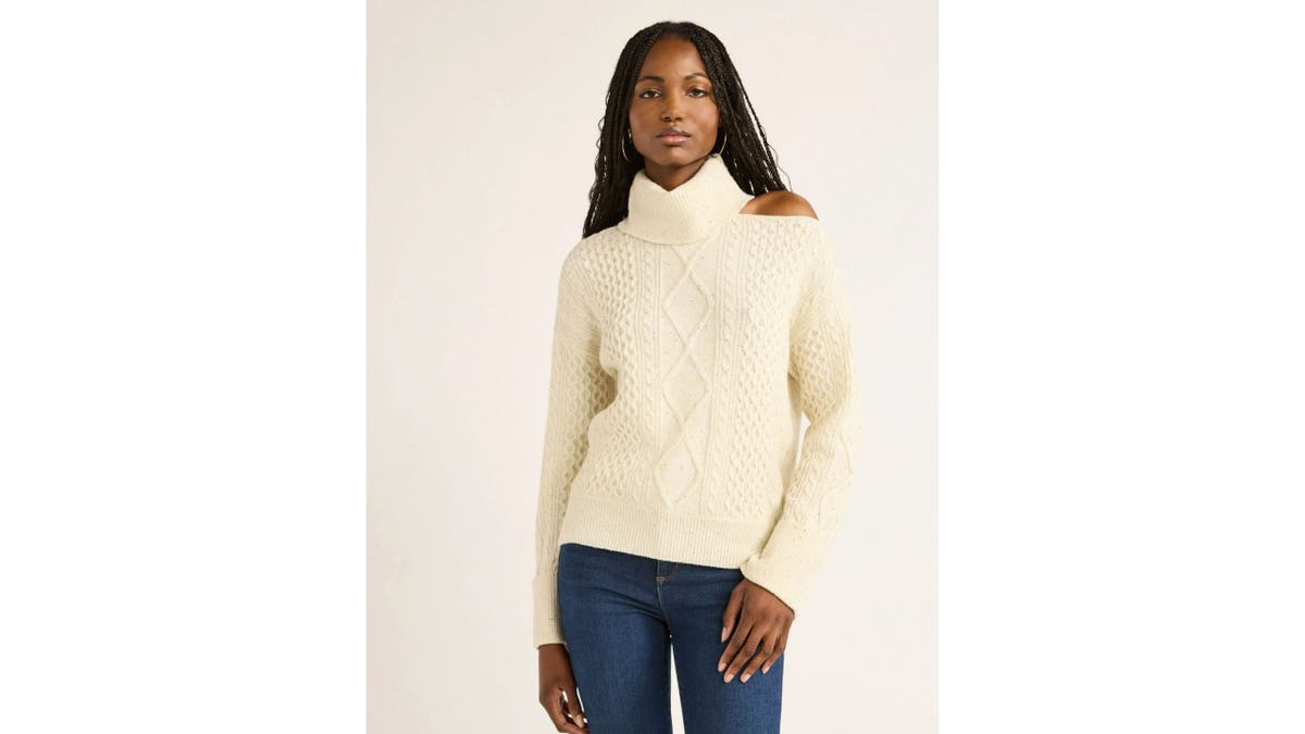 This stylish sweater is a great way to dress-up casual looks.