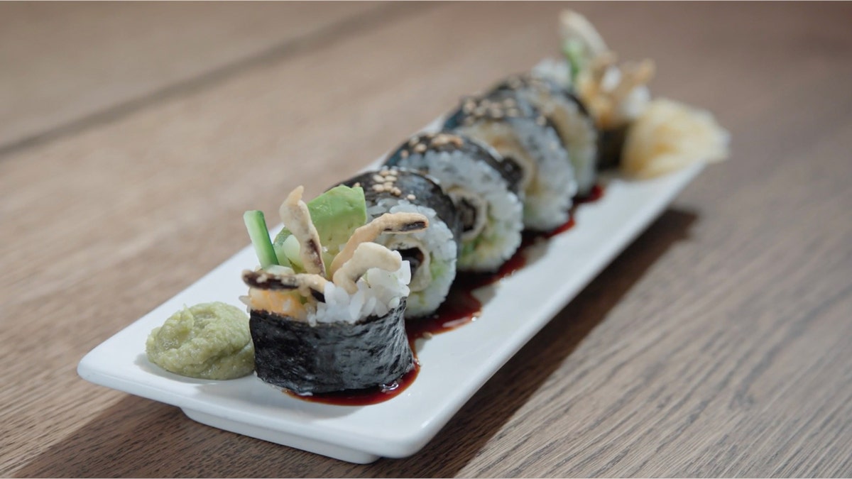 A soft-shell tarantula spider roll is shown.