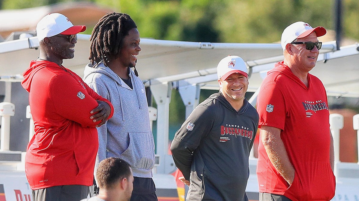 Teddy Bridgewater laughs with Todd Bowles