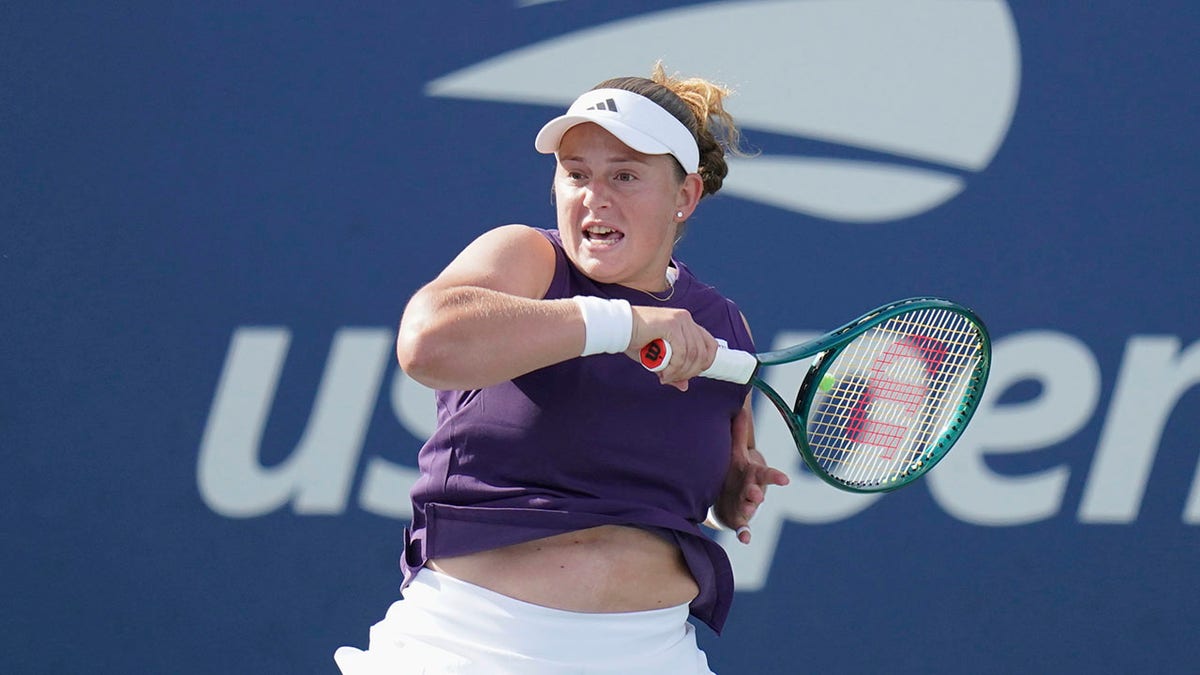 Jelena Ostapenko sends the ball back