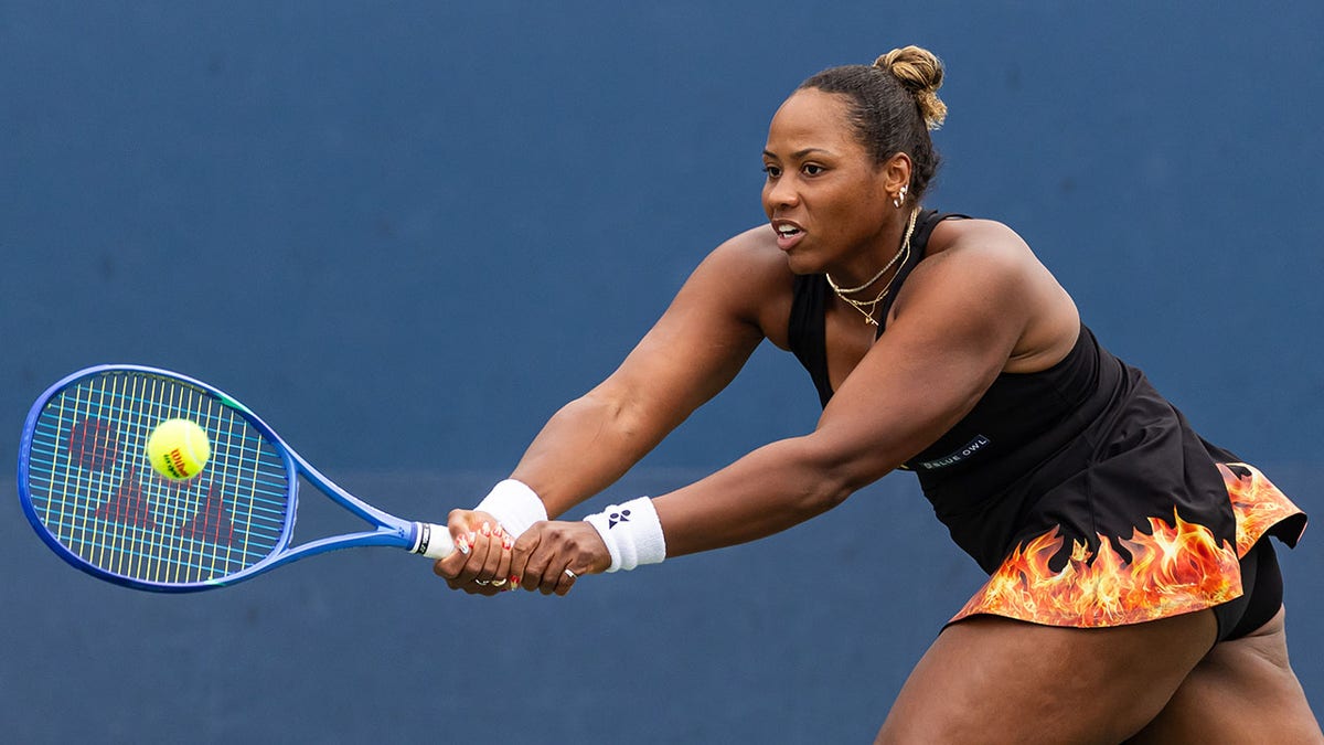 Taylor Townsend sends the ball back