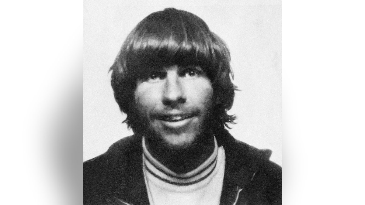 A mugshot of Tex Watson
