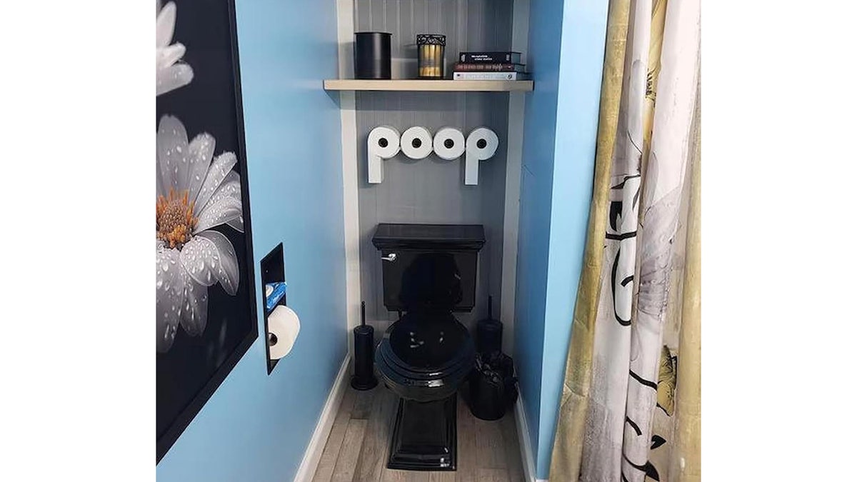 This holder spells out a word when full of toilet paper.