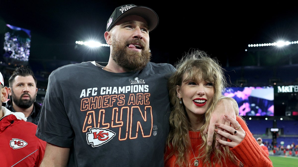Travis Kelce and Taylor Swift on the football field
