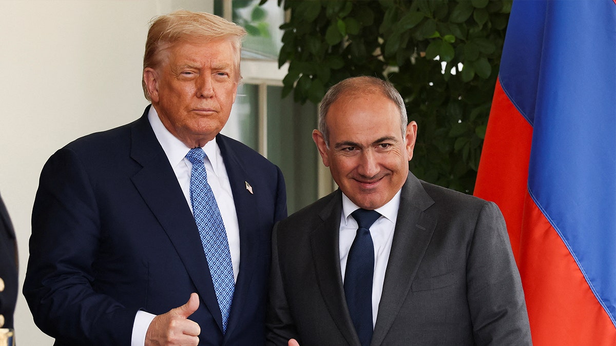 U.S. President Donald Trump and Armenian Prime Minister Nikol Pashinyan arrive to meet at the White House in Washington, DC on August 8, 2025