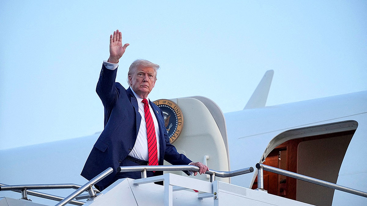 President Trump waves to supporters as he leaves Allentown, Pennsylvania