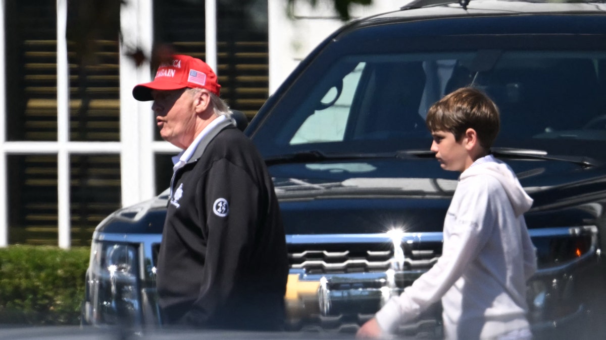 Presidente Donald Trump com o neto Spencer