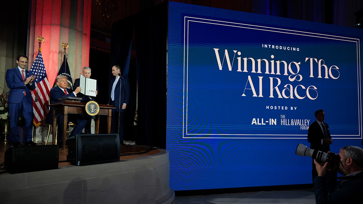 Trump on stage during AI summit