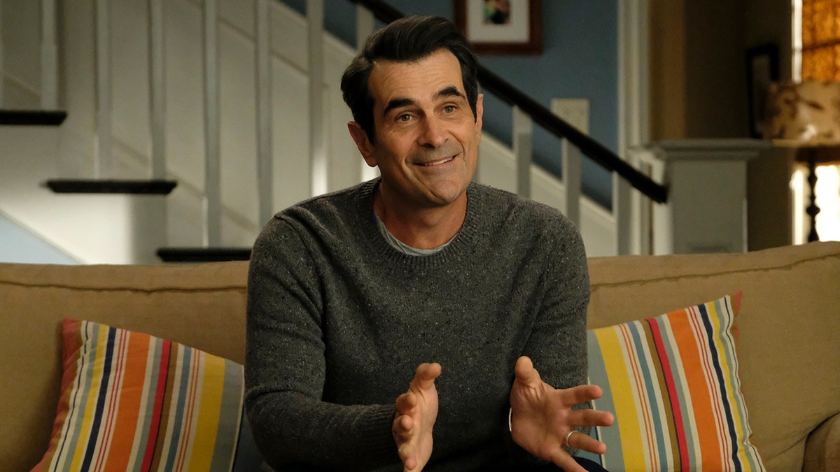 Ty Burrell holds the gray skin on a new family.