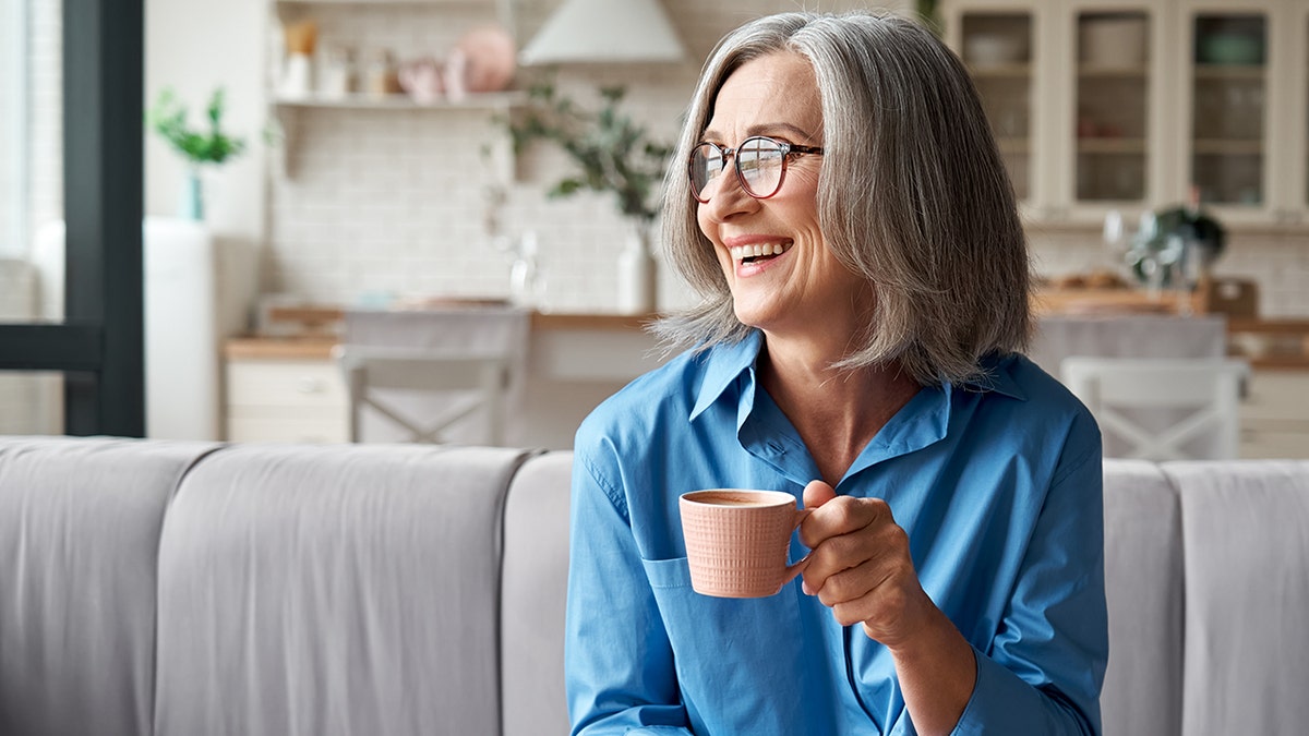 Older woman drinking coffee