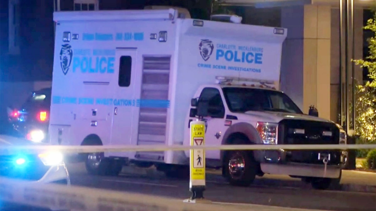 Police at the East/West Boulevard light rail station.