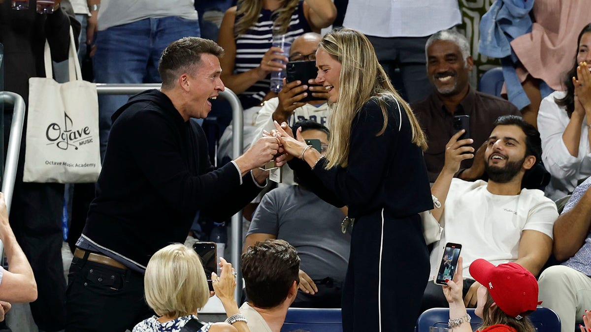 Fan proposes during US Open match