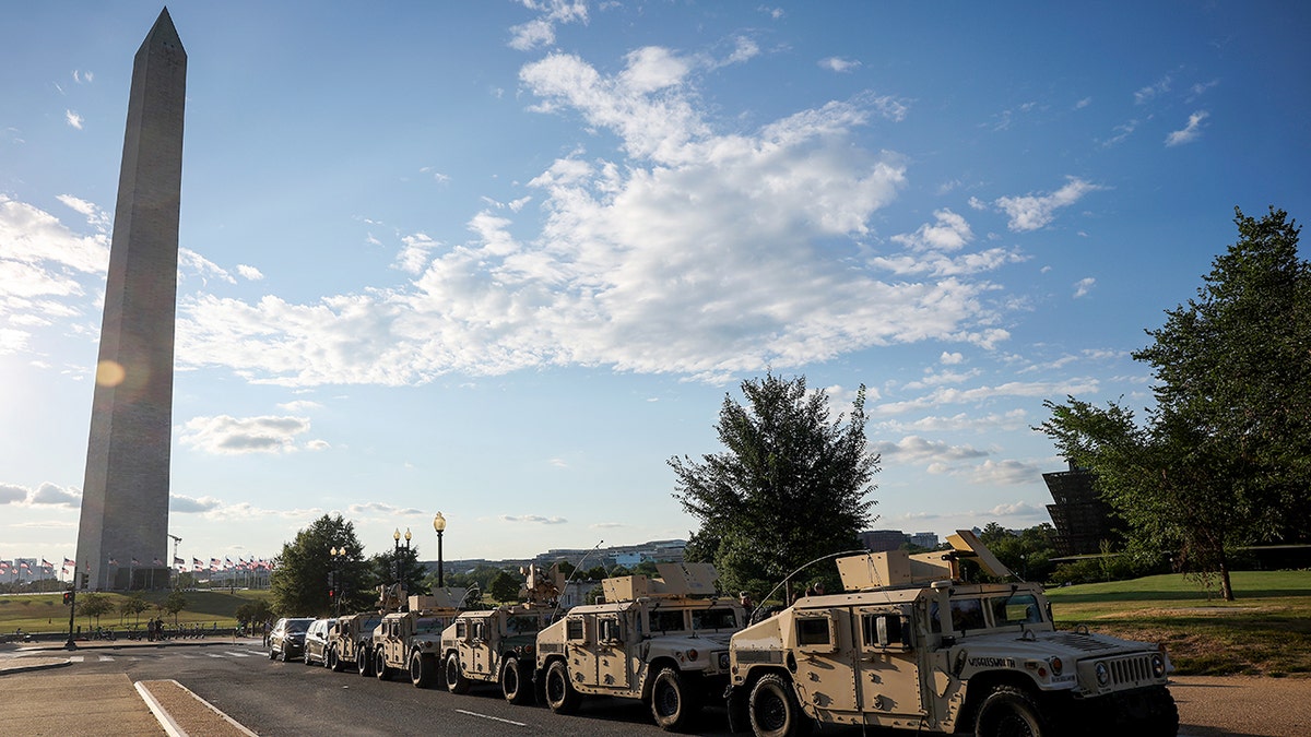 Military vehicles near the Washington Monument