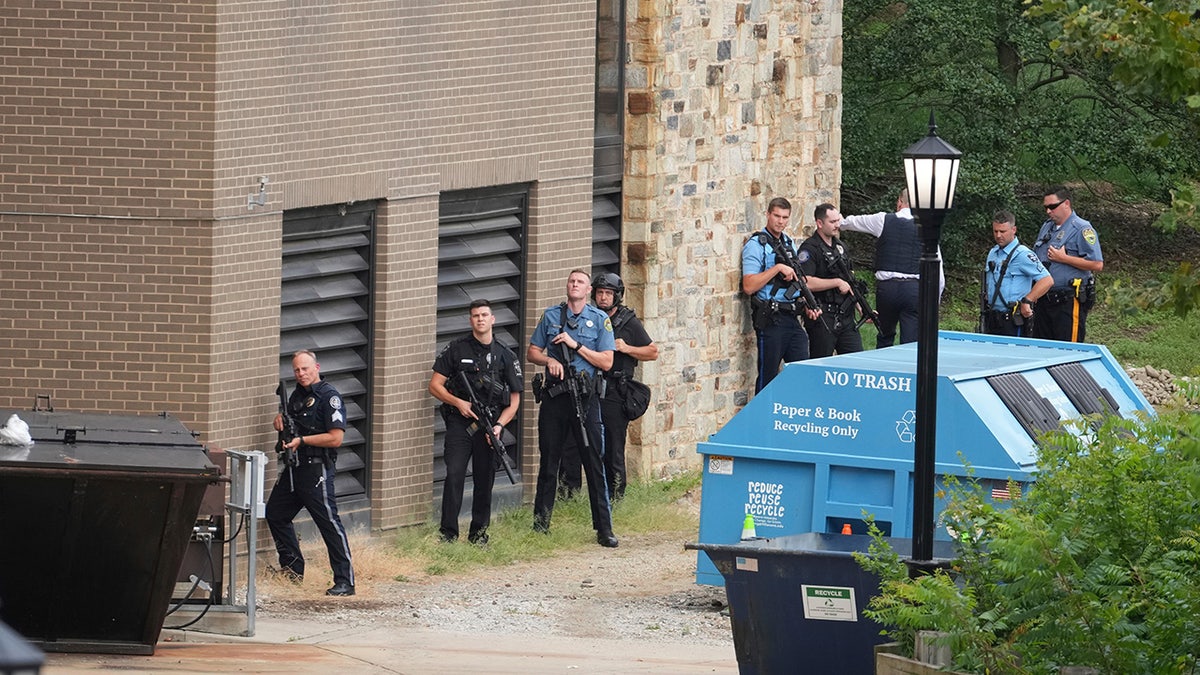 Police gather at the Villanova University campus where an active shooter was reported Thursday, Aug. 21, 2025, in Villanova, Pa.