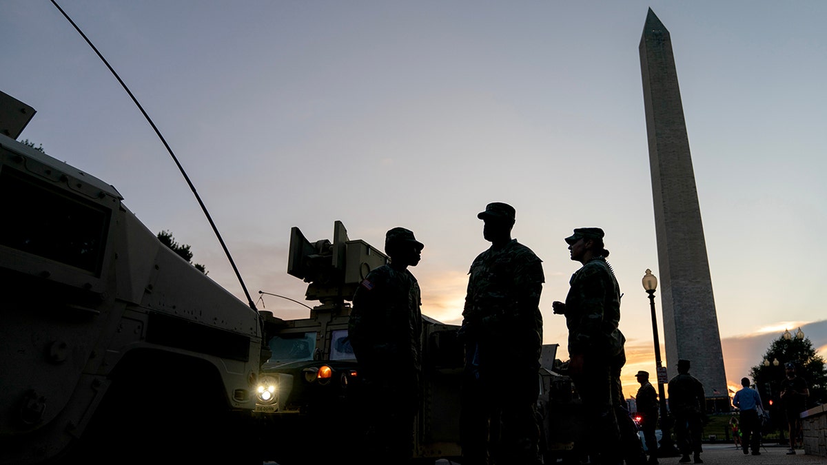 Federal law enforcement stand guard in Washington D.C. amid Trump's takeover of the police department