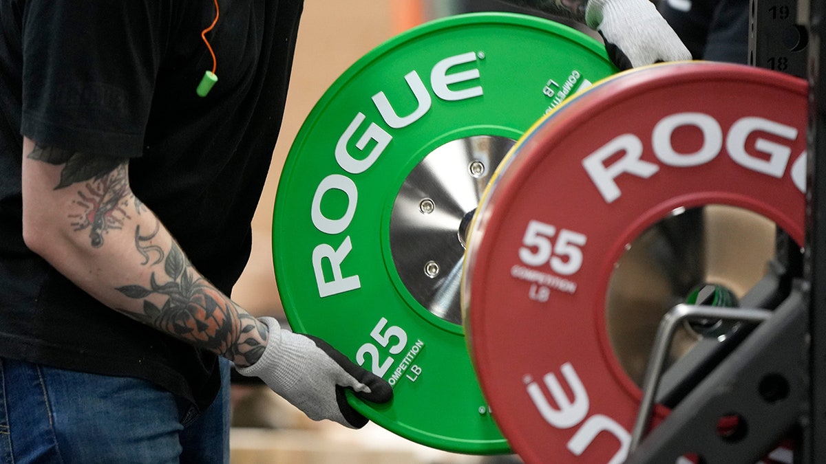 A person is about to raise weights