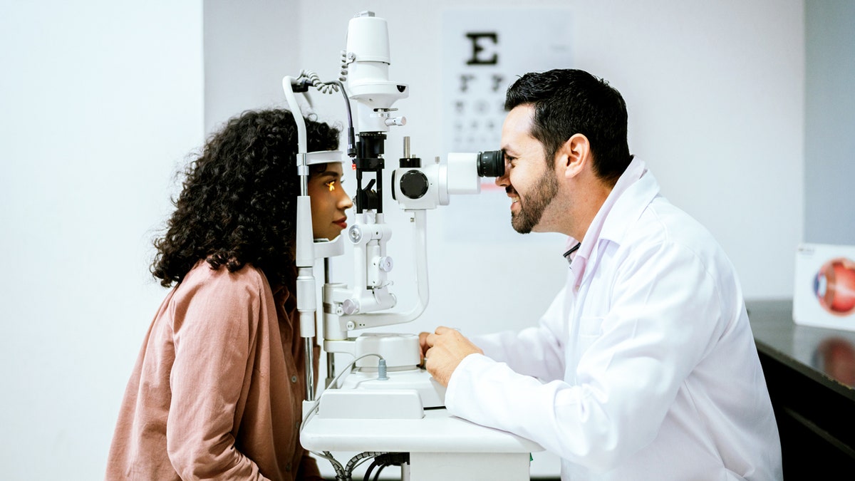 Woman at eye doctor