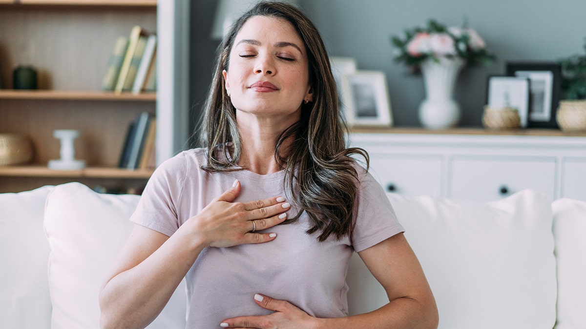 woman deep breathing