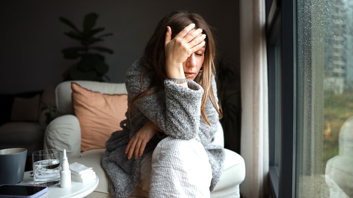 Woman feeling sick