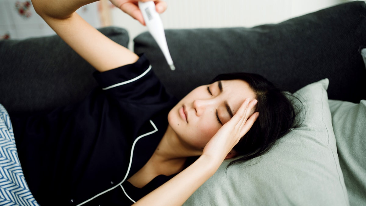 Sick woman fever