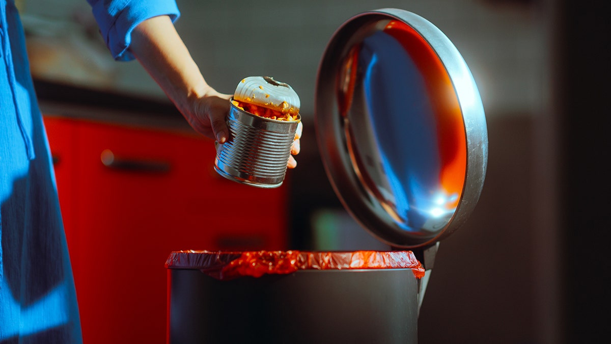 When a woman dumps it into open kitchen garbage, it can be seen up close
