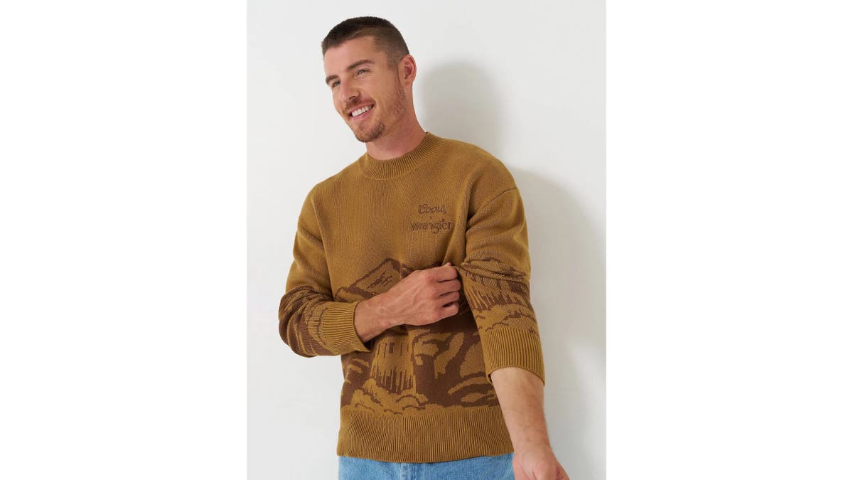 This crewneck sweater features a soft cotton and wool blend.