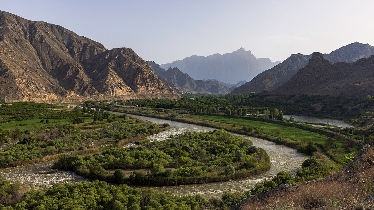 A view from Armenia's southern border reveals the Arax River, with Iran visible across the water. This crossing is a vital lifeline for Armenia, facilitating essential trade and energy flows, especially as tensions rise over the proposed Zangezur Corridor. Iran strongly opposes the corridor, fearing it would sever its direct land access to Armenia and diminish its role as a regional transit hub. The corridor, intended to connect Azerbaijan to its Nakhchivan exclave through Armenian territory, has become a flashpoint in regional geopolitics.