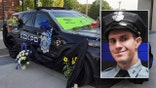 Kansas City Kansas police officer Hunter Simoncic (inset) and his patrol vehicle following his death.
