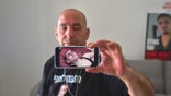 Ofir Braslavski shows a video from terrorist group Palestinian Islamic Jihad, published last week of his son Rom gaunt and emaciated in captivity in Gaza.