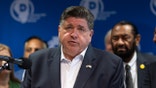 Pritzker addresses the media