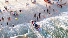 Beach visitors risk 'arrest' for swimming without lifeguard following tragic incident