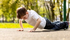 Stepdad punishes boy's disrespect with pushups and squats in viral video