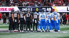 Lions, Falcons stop play and gather in prayer after Morice Norris suffers serious injury
