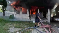 New Jersey child jumps from second floor of burning home into officer's arms