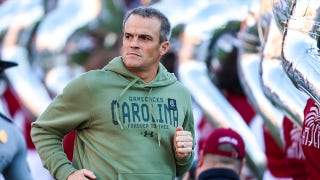 Which college football coaches improved or tanked their hot seat status four games into the season?