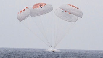 Astronauts splash down in Pacific after completing ISS mission that relieved stranded crew members